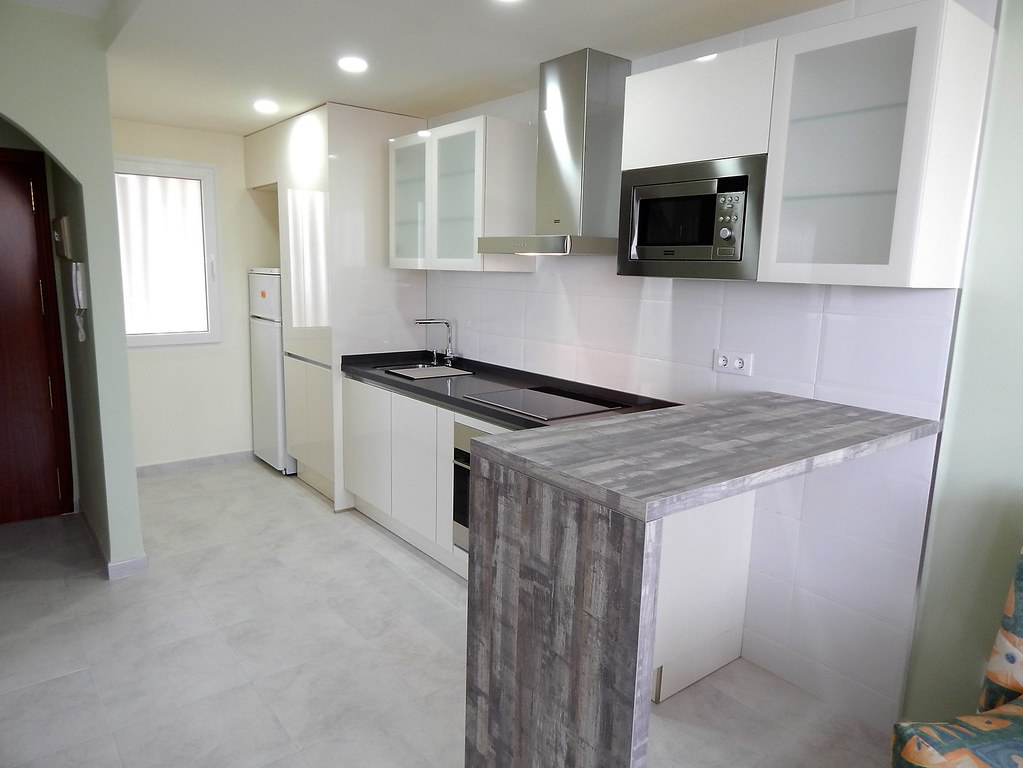 Muebles de cocina en magnolia y pino vintaje